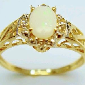 14KT Gold Opal And Diamond Ring size 7